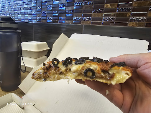 Photo of Eddie's Donair & Pizza - 16767 91 St NW, Edmonton, AB T5Z 2X4